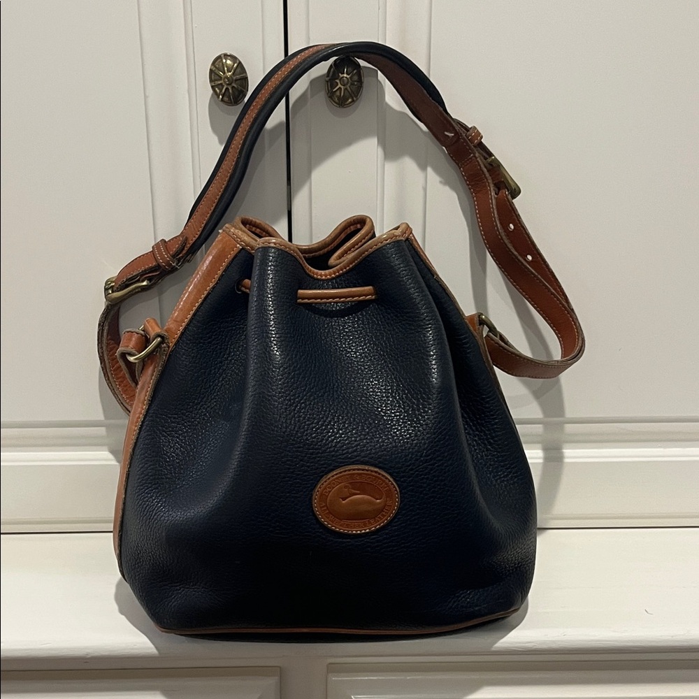Dooney & Bourke Navy and Tan leather drawstring Bag